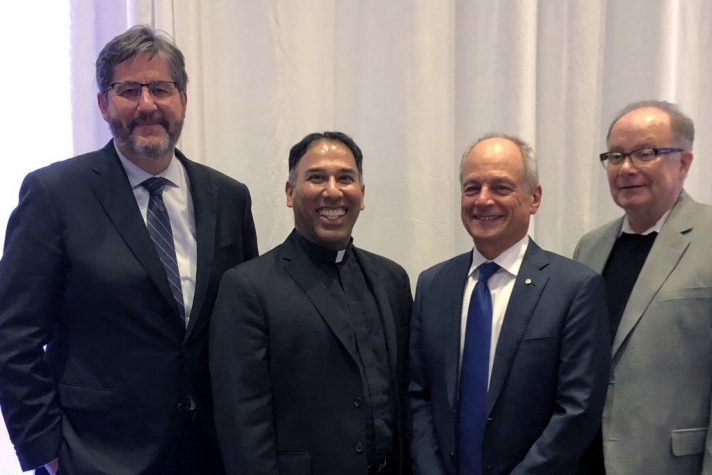 Left to Right: Dr. David Sylvester, Fr. Kevin Storey, CSB, President Meric Gertler, and Father T. Allan Smith, CSB