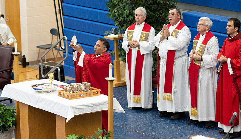 Fr Storey celebrates Mass at Detroit Catholic Central