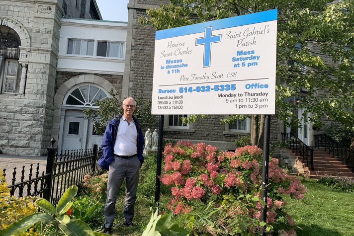 Father Scott, CSB in front of Église St-Charles in Montreal, Quebec where he celebrates Mass for two communities.