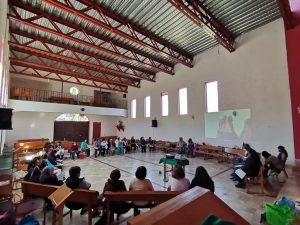 Community meeting takes place in chapel
